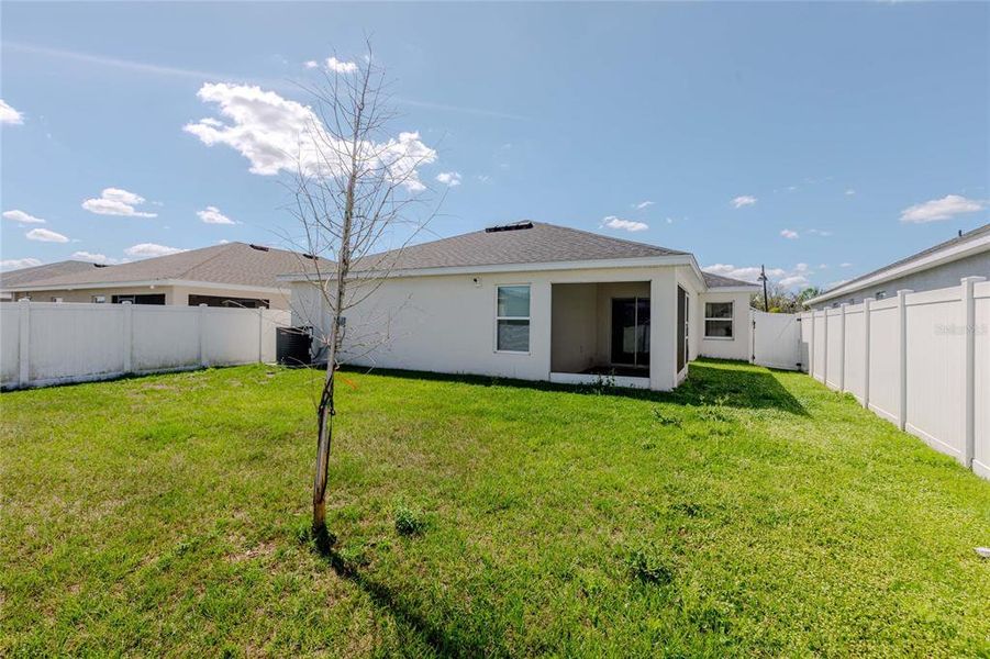 Exterior details and patio area of a home in , Zephyrhills (Image 22).