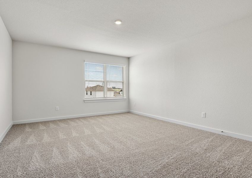 The master bedroom has a large window that lets in great, natural light. The master bedroom has a large window that lets in great, natural light.