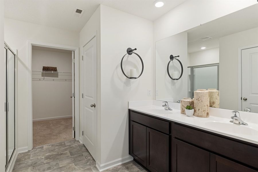 Representative furnished interior of a home built from the Hanover by D.R. Horton in Hillcrest Landing, McDonald (Image 25).