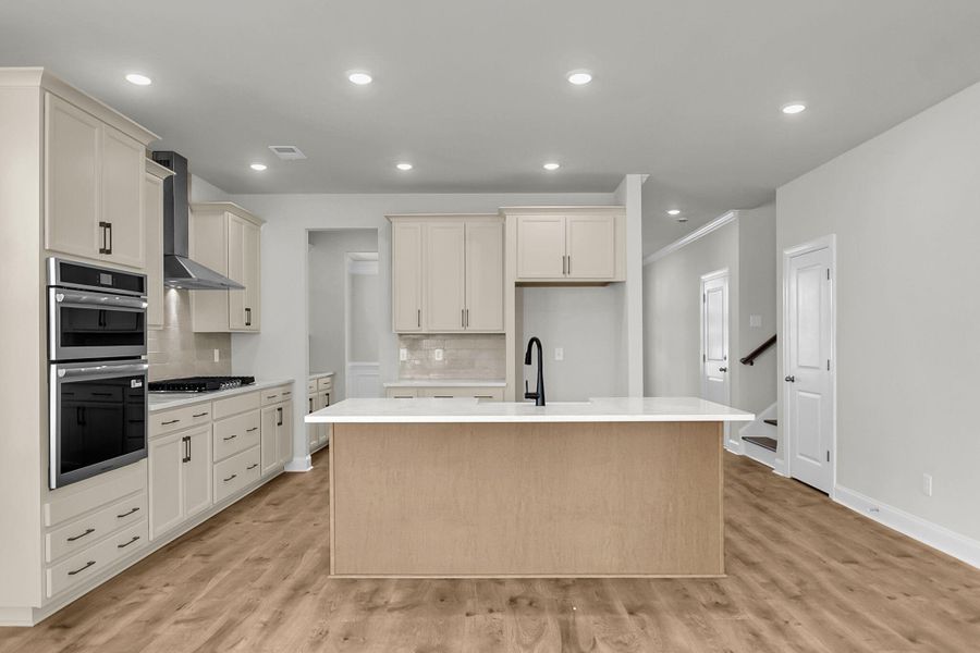 Furnished interior view inside a new home in Tidewater at Lakes of Cane Bay, Summerville (Image 9).