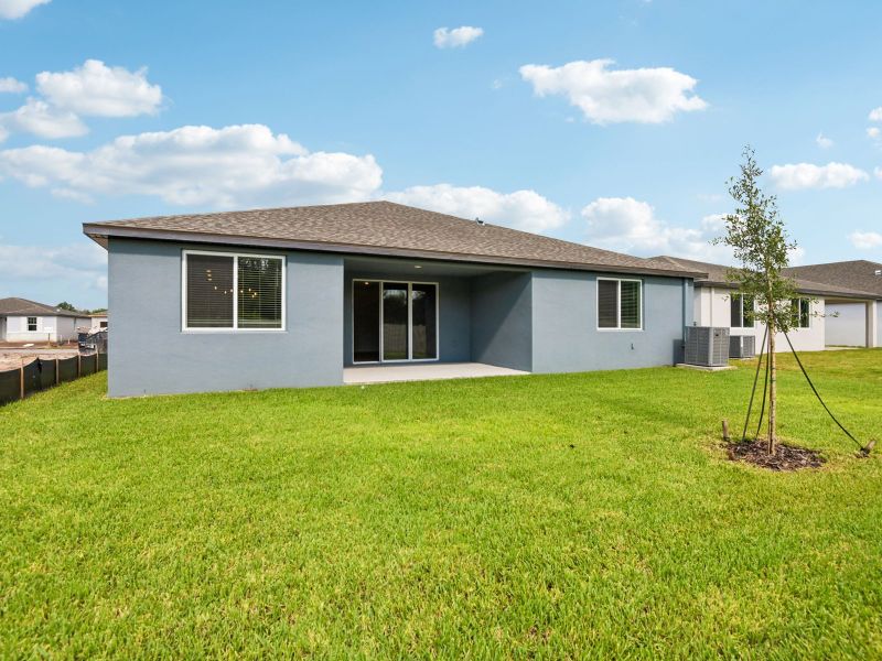 Exterior details and patio area of a home in Pine Ridge Meadows, Hudson (Image 3).