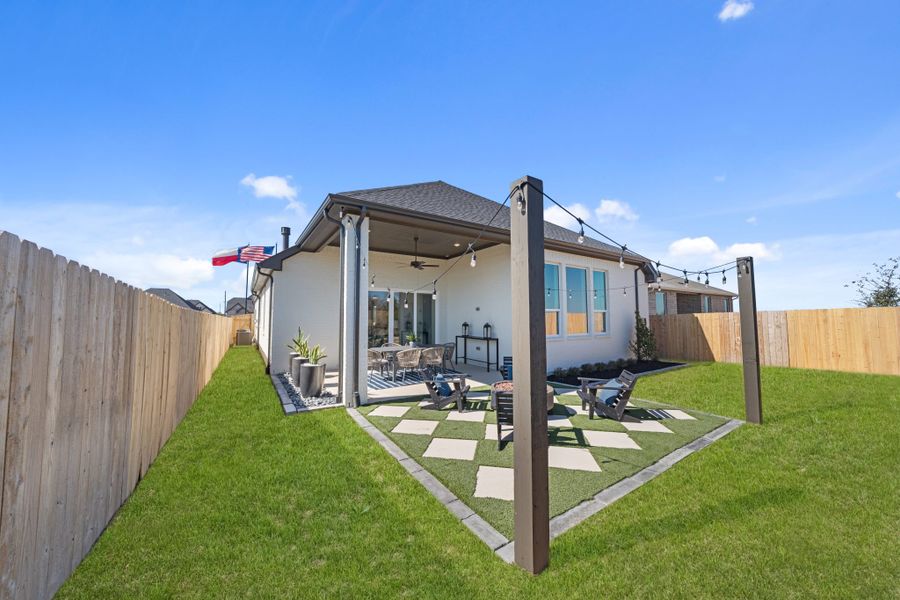 Exterior details and patio area of a home in Meridiana, Manvel (Image 35).