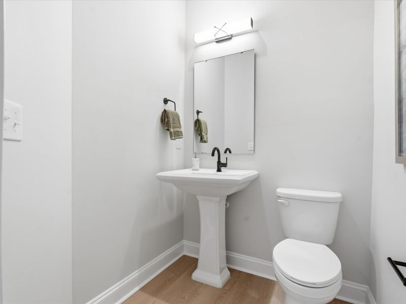 Representative furnished interior of a home built from the Dahlia by Tri Pointe Homes in Bellflower, Charlotte (Image 19).