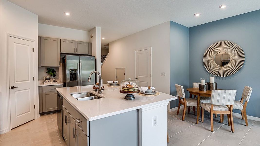 Representative furnished interior of a home built from the Jasmine by Taylor Morrison in Riverfront Townhomes, Edgewater (Image 4).