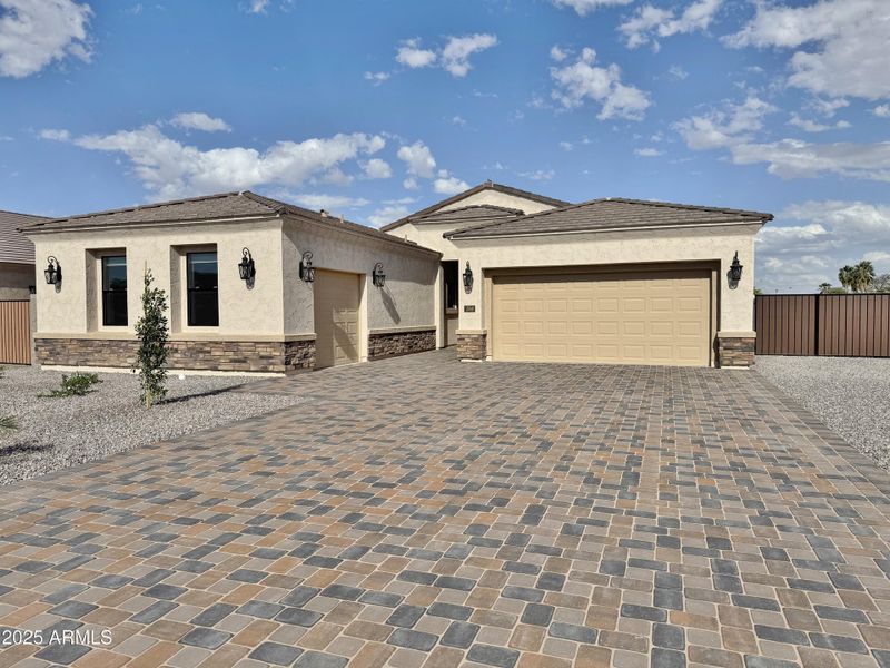 Front of home with RV gate and parking