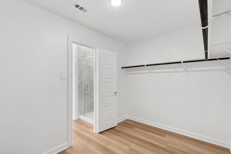 Spacious, unfurnished interior of a new home in Pinewood at Grand Texas, New Caney (Image 16). Spacious, unfurnished interior of a new home in Pinewood at Grand Texas, New Caney (Image 16).