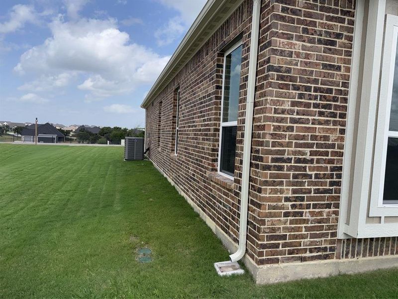 Exterior details and patio area of a home in Calhoun Acres, Azle (Image 3).