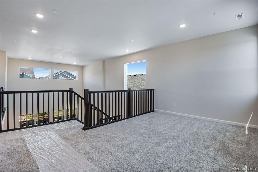 Spacious, unfurnished interior of a new home in Reunion Ridge, Commerce City (Image 36).