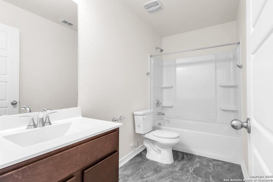 Furnished interior view inside a new home in Spanish Trails Villas, San Antonio (Image 5).