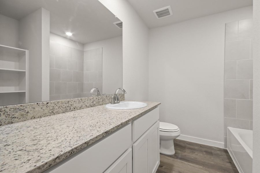 Furnished interior view inside a new home in Crockett Meadows, Conroe (Image 7).