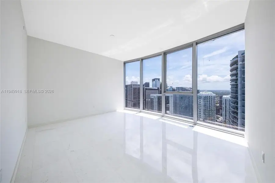 Spacious, unfurnished interior of a new home in Aston Martin Residences, Miami (Image 21).