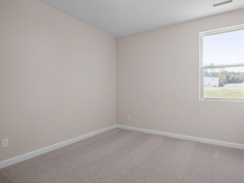 Spacious, unfurnished interior of a new home in Wellers Knoll, Lillington (Image 13).