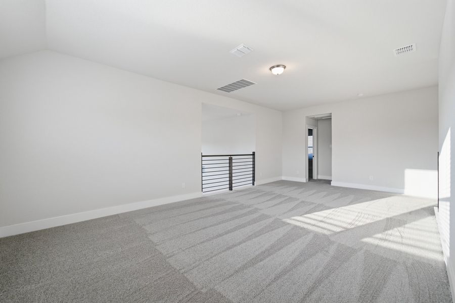 Spacious, unfurnished interior of a new home in The Woodlands at Medina Hills, Mico (Image 36).
