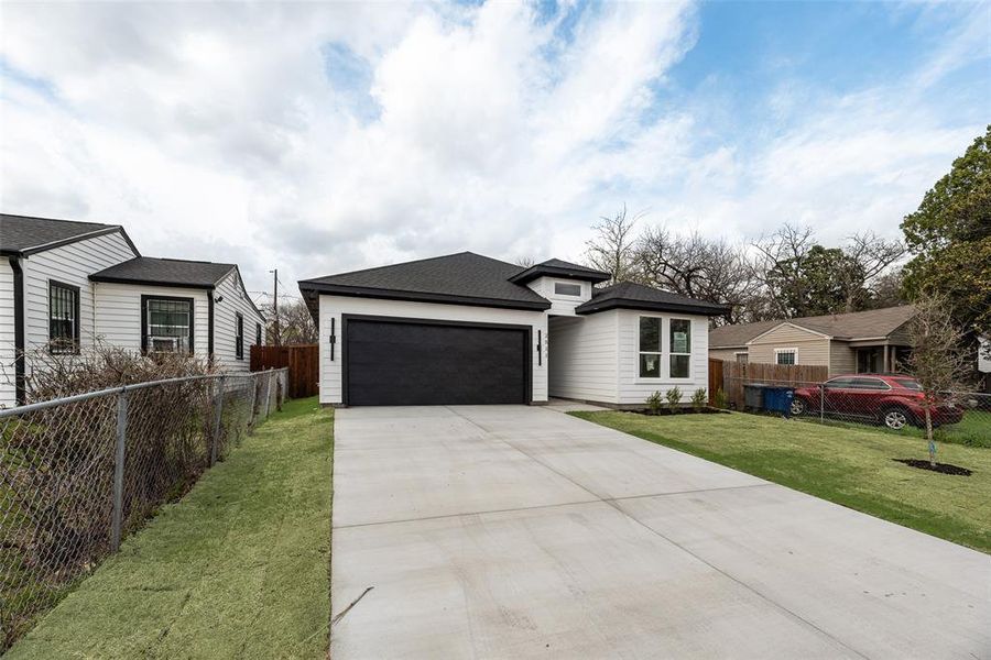 Front exterior of a new home in , Dallas, TX, highlighting curb appeal (Image 16).