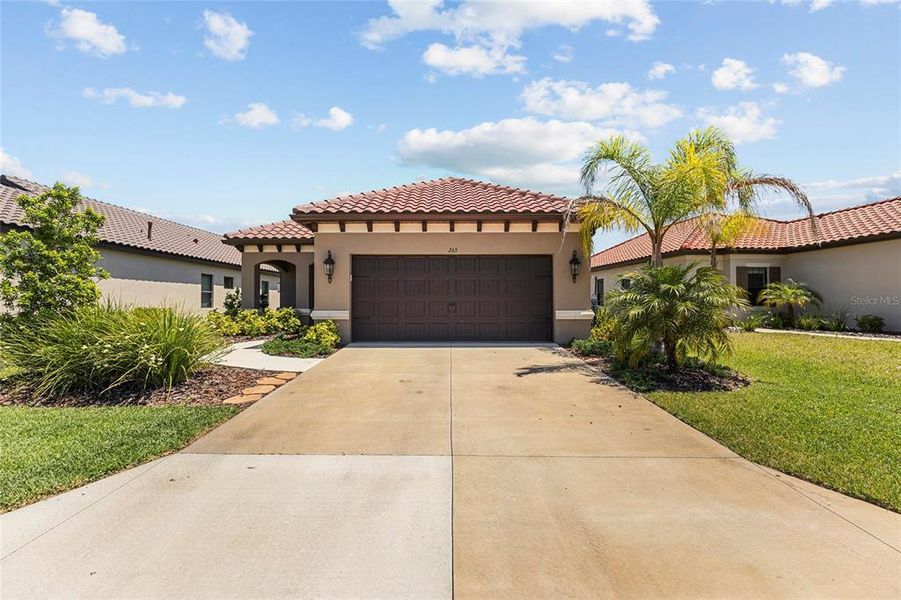 Front exterior of a new home in , Nokomis, FL, highlighting curb appeal (Image 24).