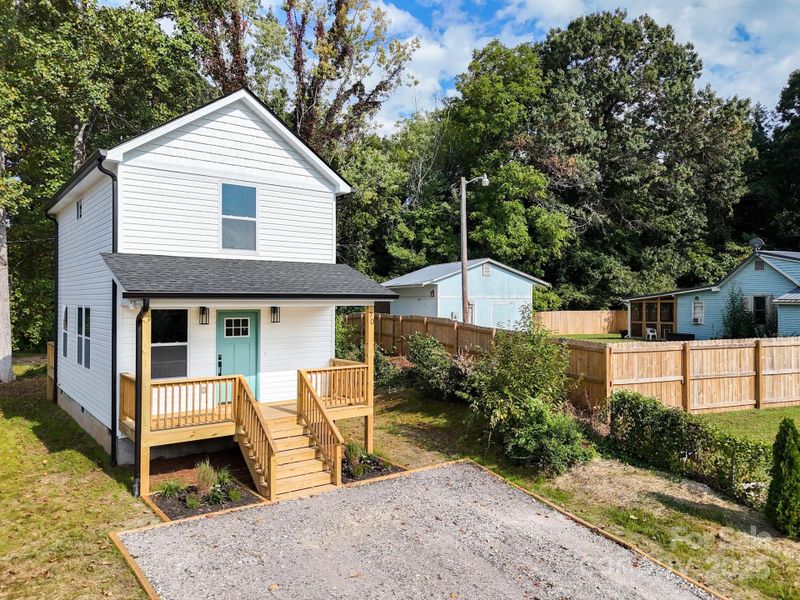 Front exterior of a new home in , Marion, NC, highlighting curb appeal (Image 21).