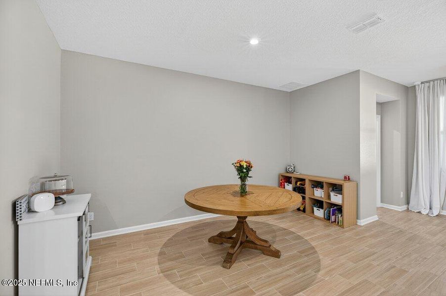 Furnished interior view inside a new home in Sandridge Hills, Green Cove Springs (Image 32).