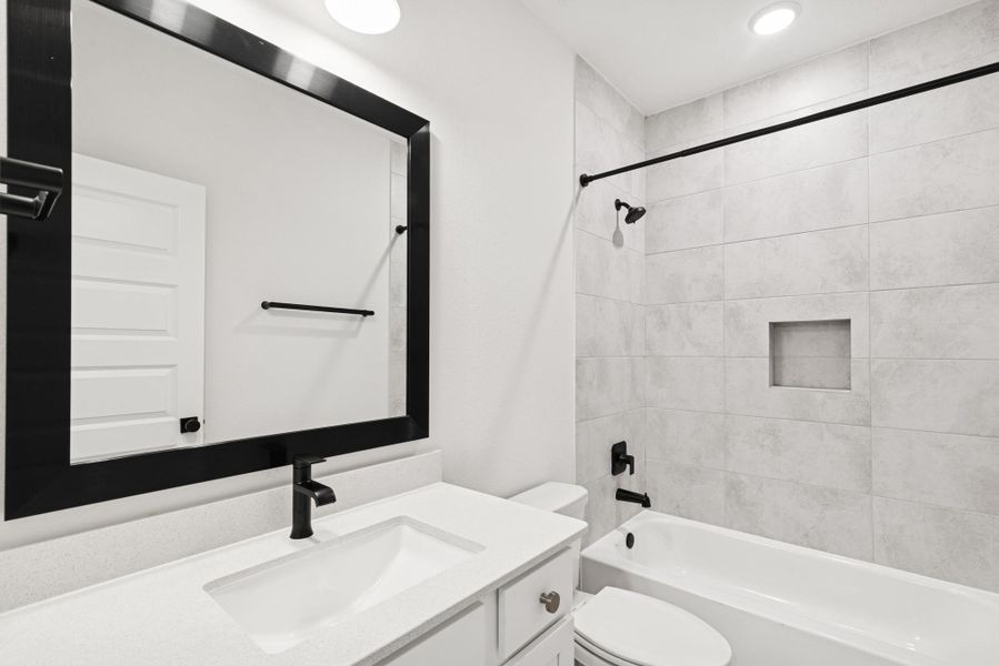 Furnished interior view inside a new home in The Highlands - Grove Collection, Porter (Image 12).
