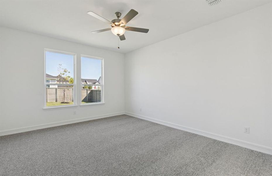 Elegant owner's suite with large windows