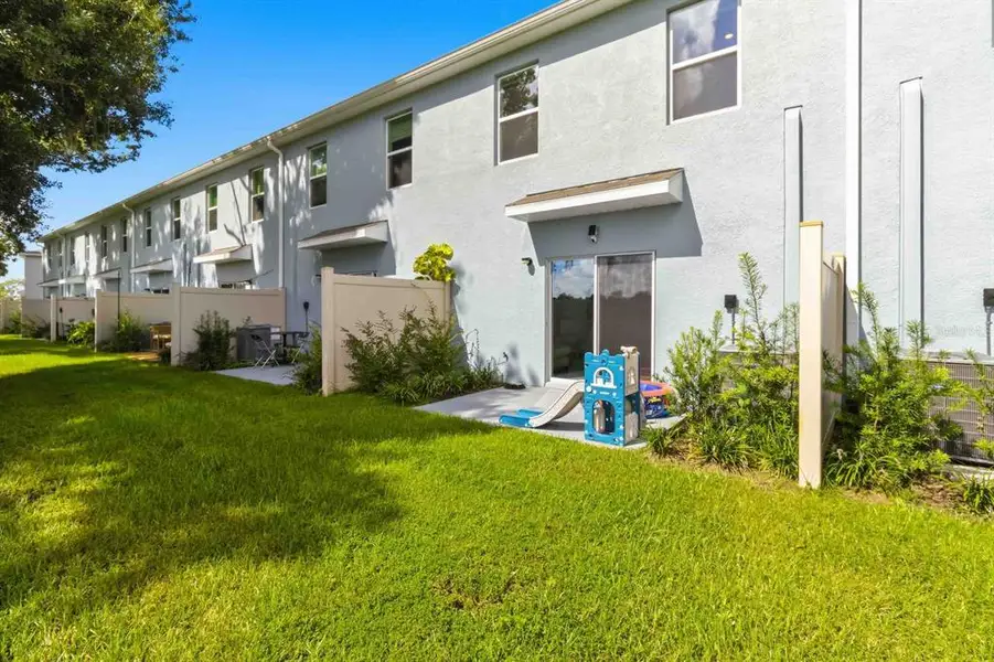 Exterior details and patio area of a home in , Tampa (Image 3).