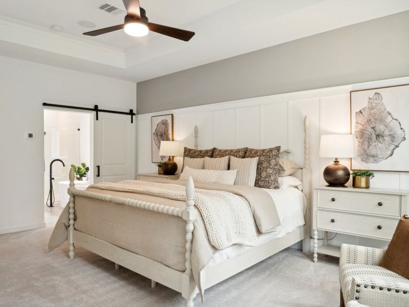 Primary suite with decorative feature wall