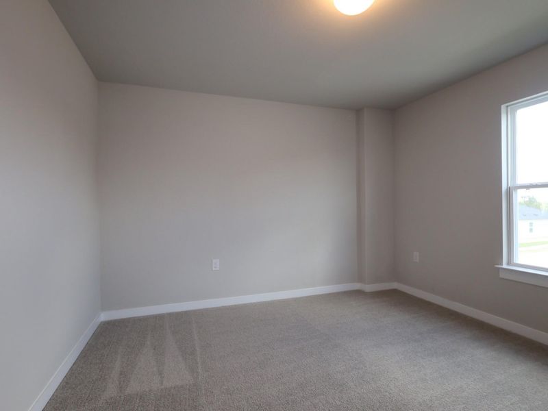 Spacious, unfurnished interior of a new home in Marble Creek Crossing, Austin (Image 10).