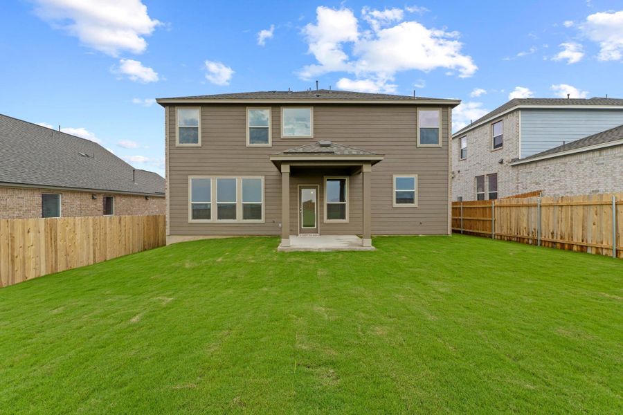 Front exterior of a new home in Salerno - Classic Collection, Round Rock, TX, highlighting curb appeal (Image 1). Front exterior of a new home in Salerno - Classic Collection, Round Rock, TX, highlighting curb appeal (Image 1).