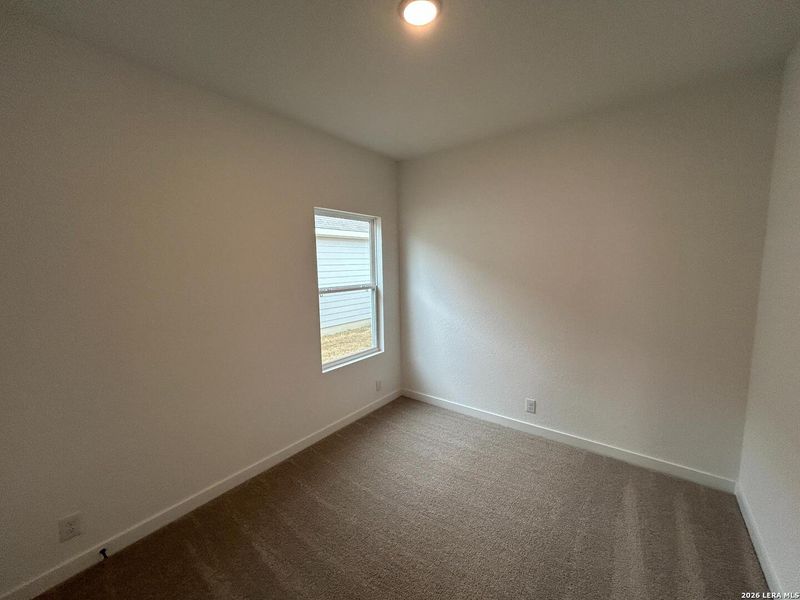 Spacious, unfurnished interior of a new home in Hennersby Hollow, San Antonio (Image 25).