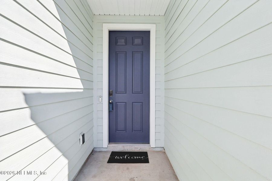 Exterior details and patio area of a home in Lakes at Bella Lago - Signature Series, Green Cove Springs (Image 22).