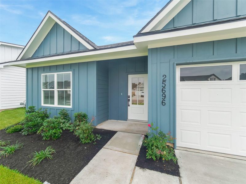 Exterior details and patio area of a home in , Splendora (Image 26).