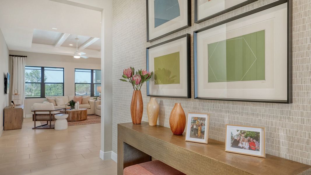 Furnished interior view inside a new home in SkySail Real Estate and Homes for Sale in Naples, FL - Neal Communities, Naples (Image 4).