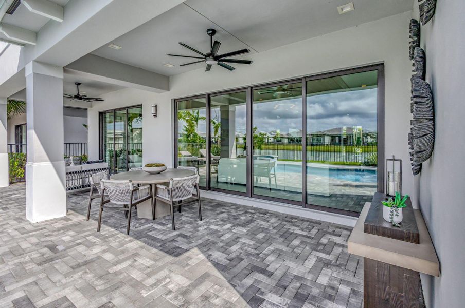 Exterior details and patio area of a home in Apex at Avenir, Palm Beach Gardens (Image 31).