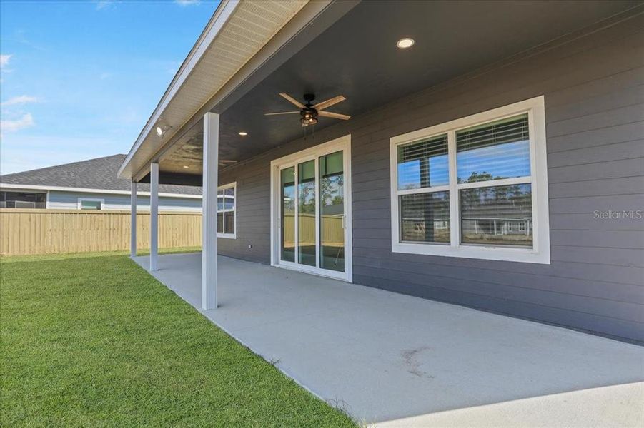 Exterior details and patio area of a home in Grand Oaks, Gainesville (Image 4).
