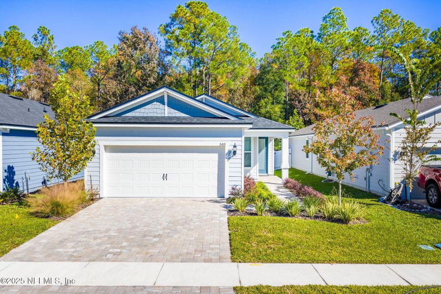 Front exterior of a new home in , St. Augustine, FL, highlighting curb appeal (Image 22).
