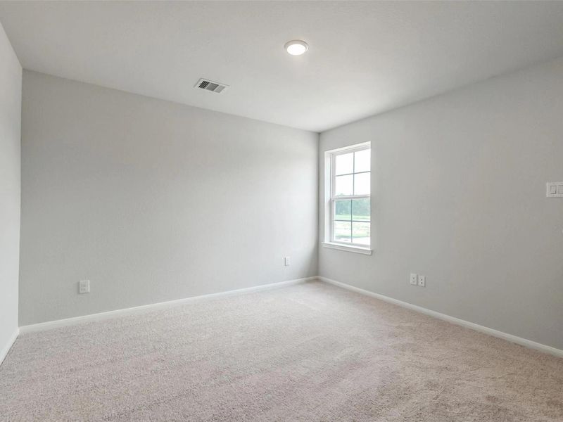 Spacious, unfurnished interior of a new home in Caney Creek Place, Conroe (Image 29).