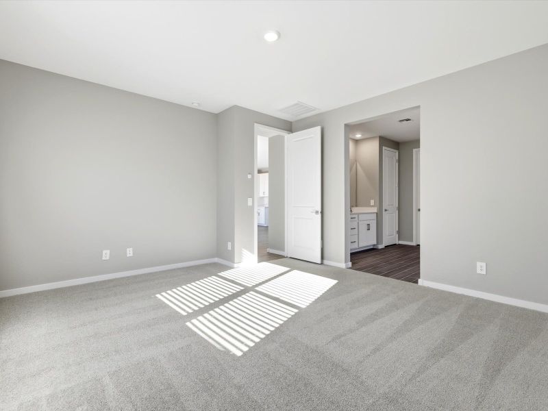 Spacious, unfurnished interior of a new home in White Tank Foothills Signature Series, Waddell (Image 11).