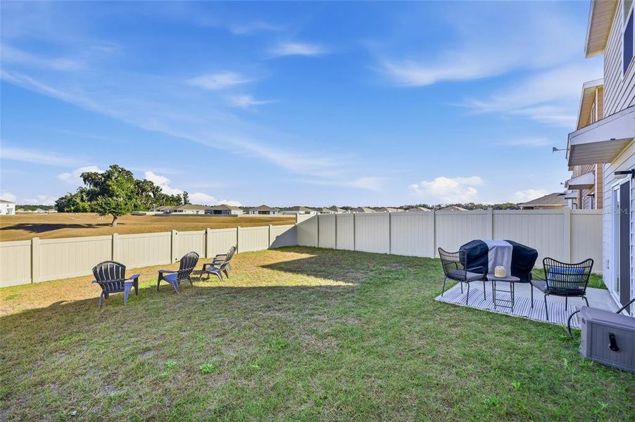 Exterior details and patio area of a home in Avalon Woods, Newberry (Image 24).