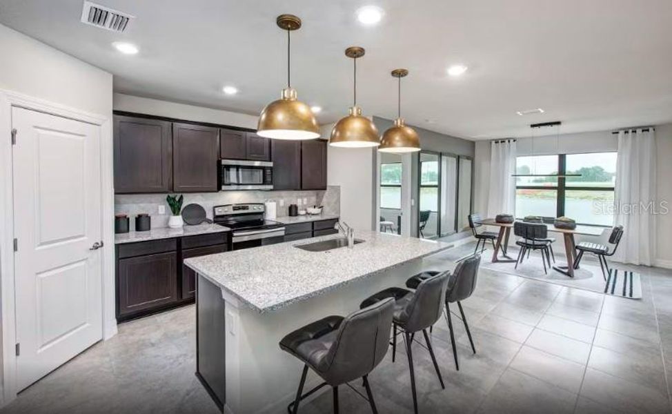 Furnished interior view inside a new home in Lakespur Wellen Park, Venice (Image 15).