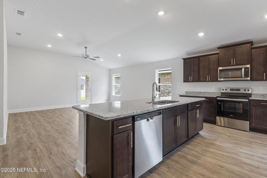 Furnished interior view inside a new home in Shadow Crest at Rolling Hills, Green Cove Springs (Image 7).