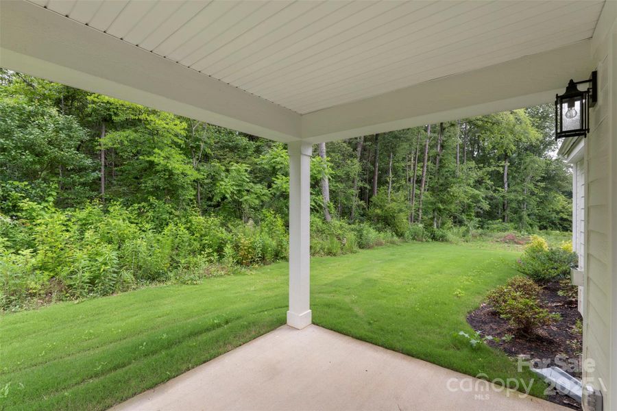 Exterior details and patio area of a home in Crescent Golf, Salisbury (Image 31).
