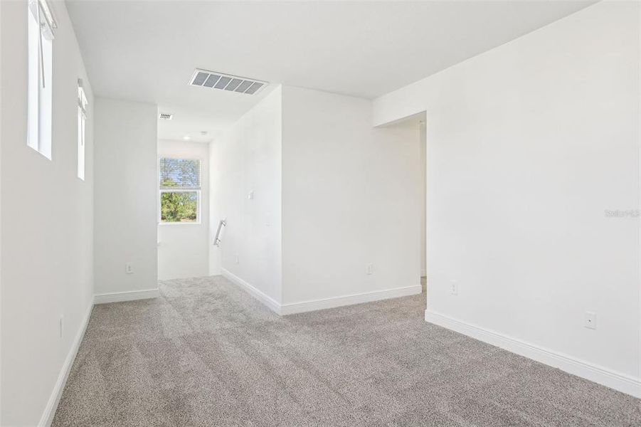 Spacious, unfurnished interior of a new home in Cyrene at Minneola - Villas, Minneola (Image 21).