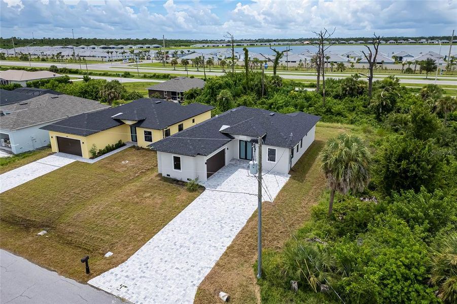 Front exterior of a new home in , Rotonda West, FL, highlighting curb appeal (Image 30).