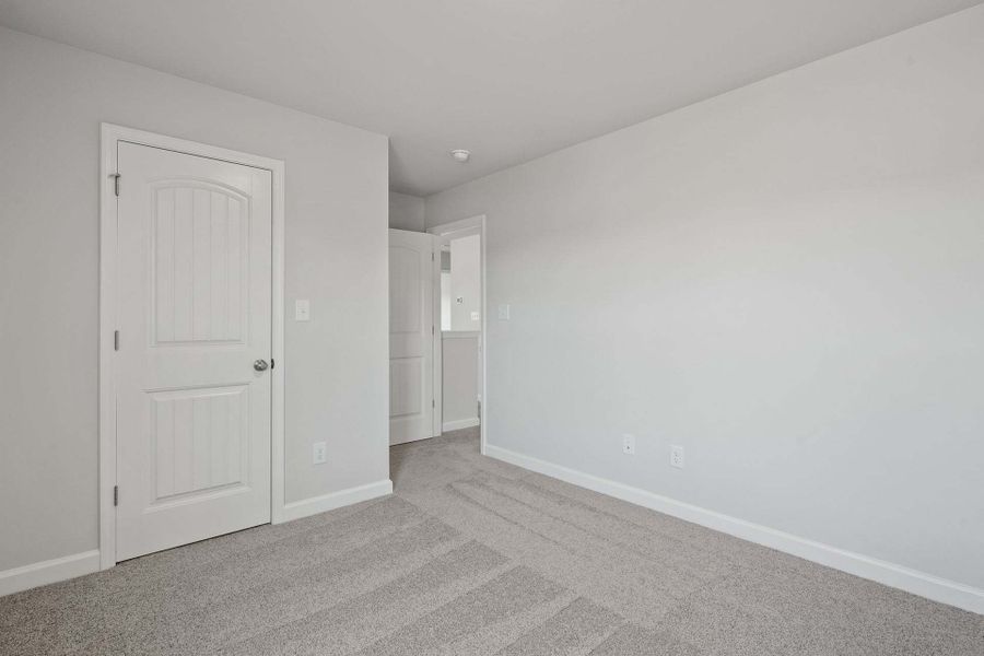 Representative unfurnished interior of a home built from the Camellia by Caviness & Cates Communities in Bartlett Manor, Youngsville (Image 101).