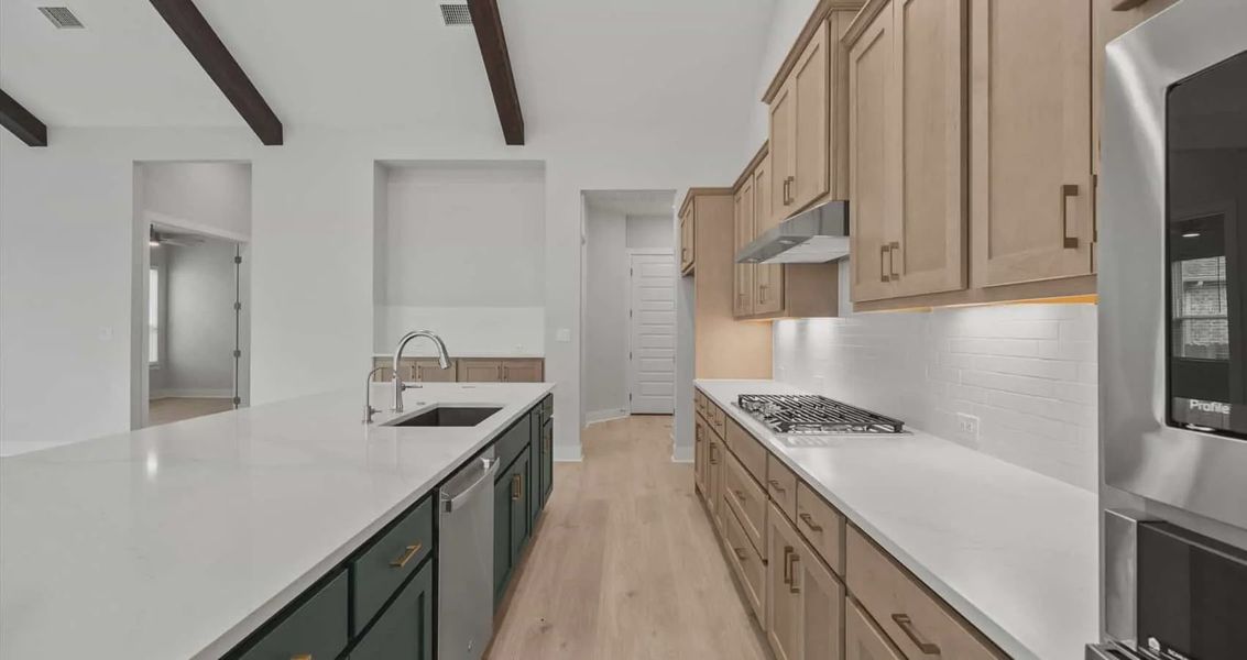 Representative furnished interior of a home built from the Draco by Chesmar Homes in Gregg Ranch, Marble Falls (Image 6).