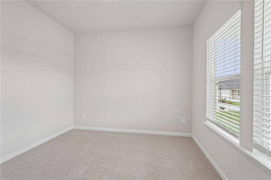 Spacious, unfurnished interior of a new home in Northwoods at Mirror Lake, Villa Rica (Image 53).