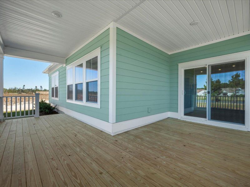 Exterior details and patio area of a home in The Coves at Lakes of Cane Bay, Summerville (Image 3). Exterior details and patio area of a home in The Coves at Lakes of Cane Bay, Summerville (Image 3).
