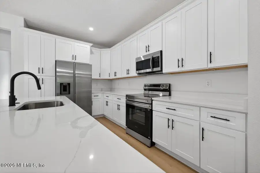 Furnished interior view inside a new home in , Starke (Image 9).