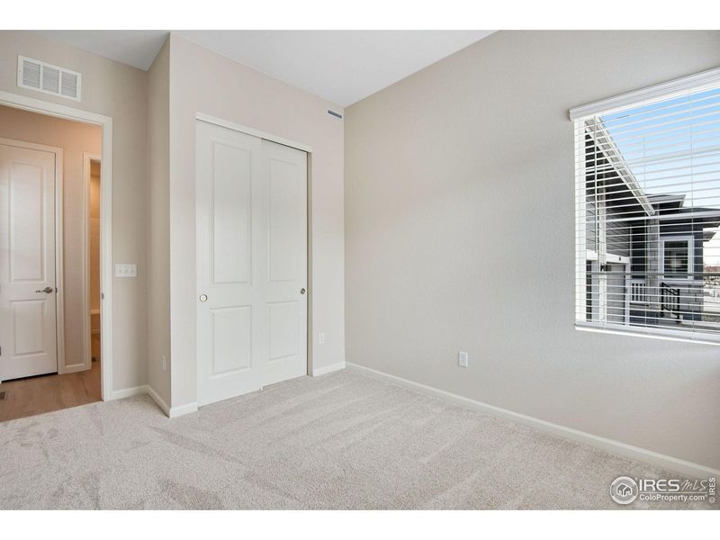 Spacious, unfurnished interior of a new home in Westside Crossing, Berthoud (Image 38).