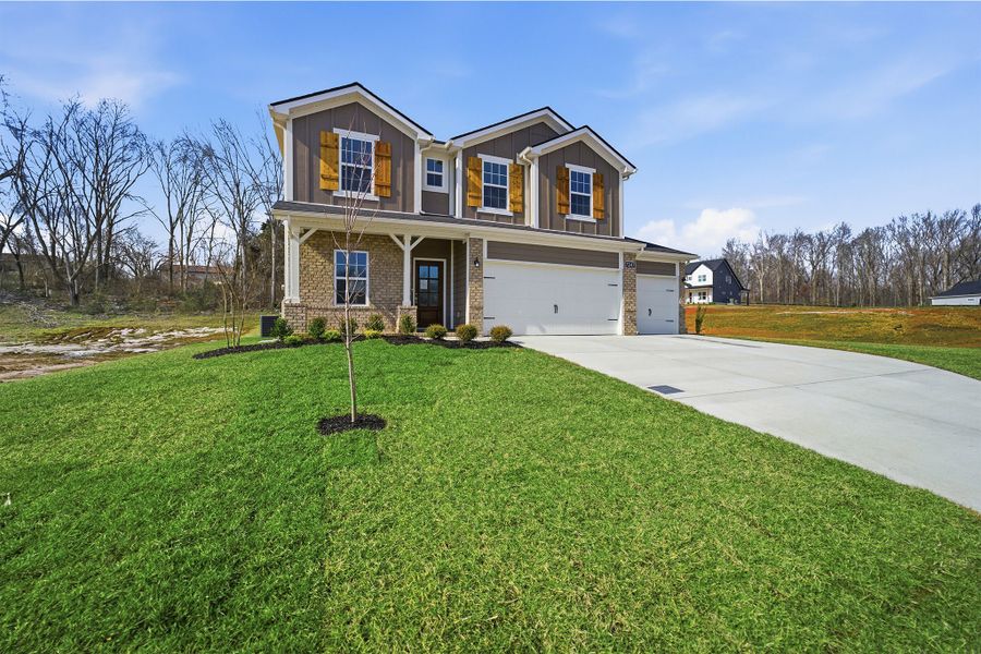 Front exterior of a new home in Brush Creek, Fairview, TN, highlighting curb appeal (Image 28).