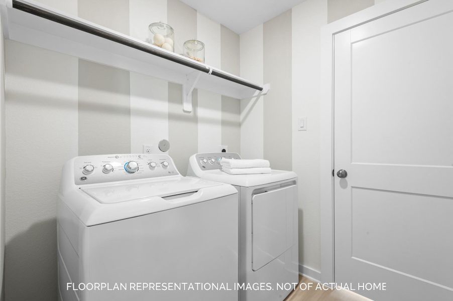 Furnished interior view inside a new home in Lone Star Landing, Montgomery (Image 12).